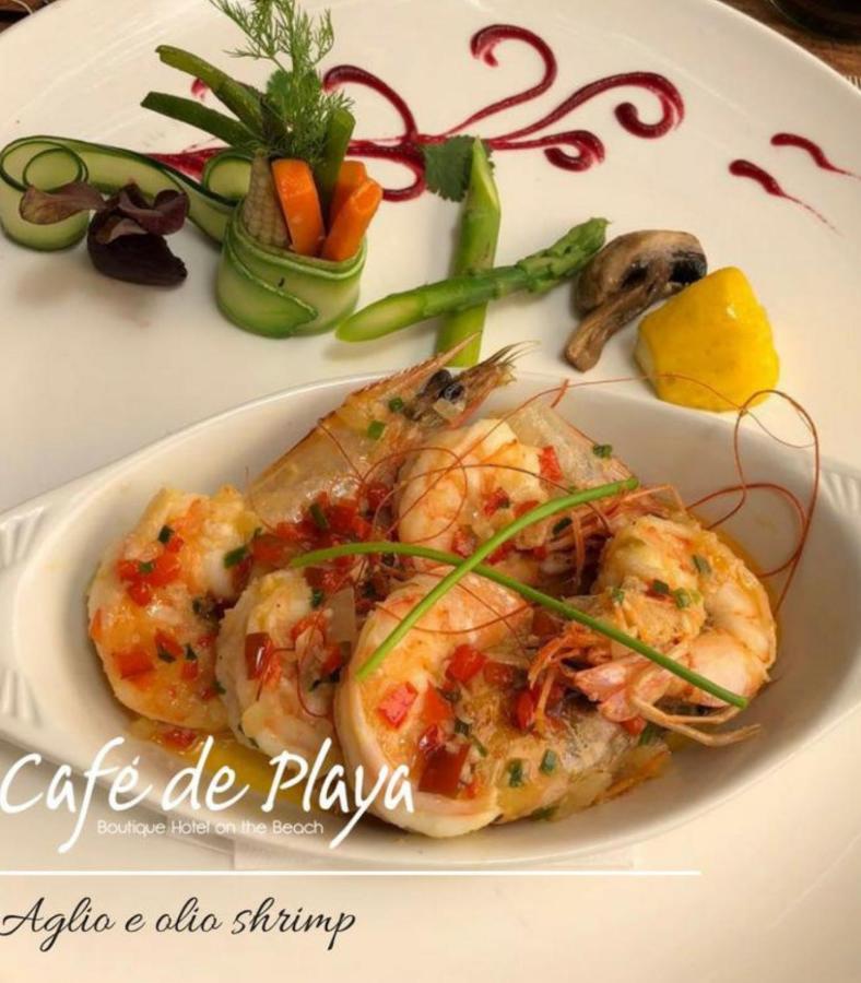 Café de Playa beach front suites Coco Esterno foto