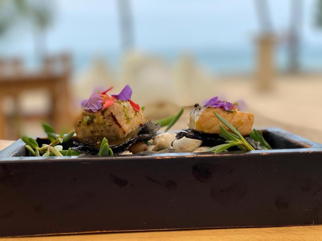 Café de Playa beach front suites Coco Esterno foto
