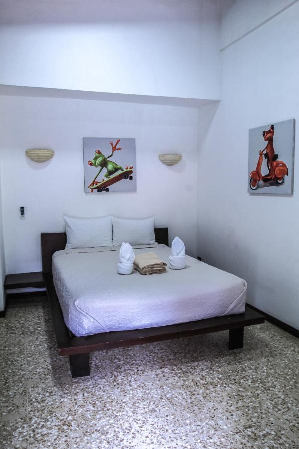 Café de Playa beach front suites Coco Esterno foto