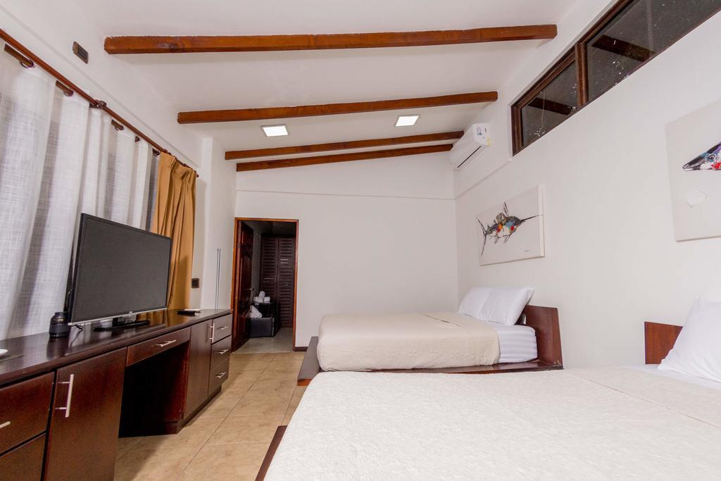 Café de Playa beach front suites Coco Esterno foto