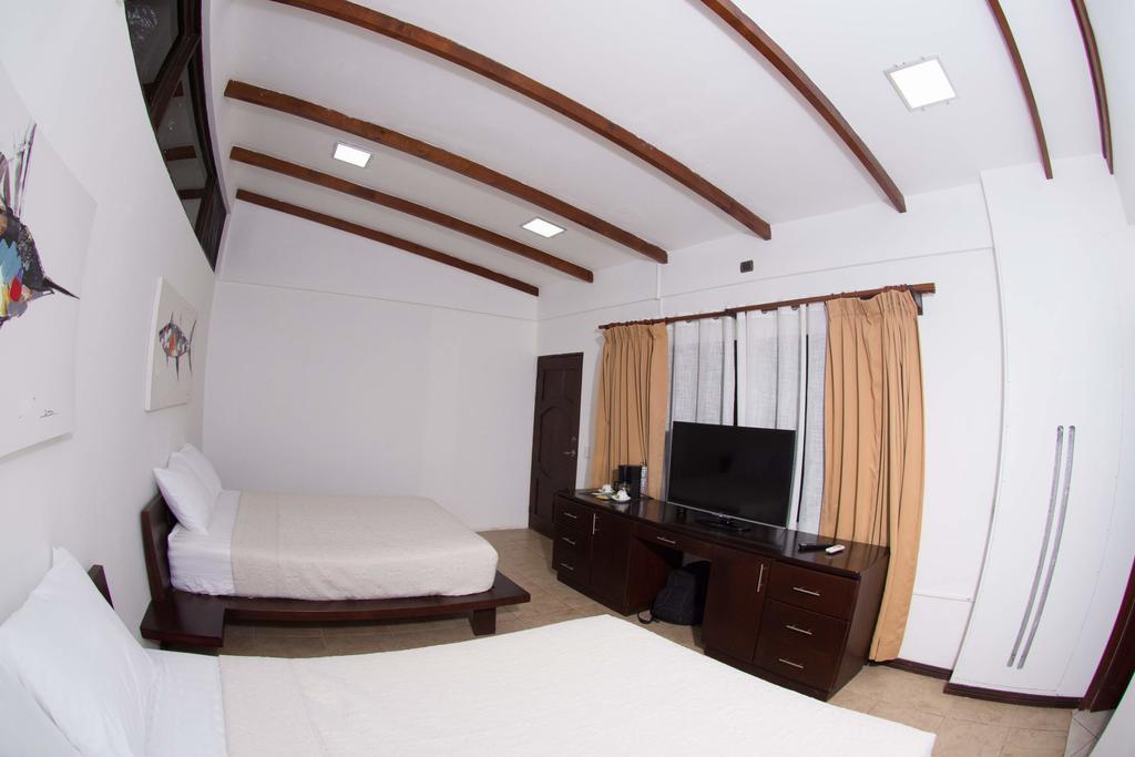 Café de Playa beach front suites Coco Esterno foto