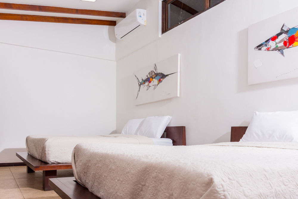 Café de Playa beach front suites Coco Esterno foto