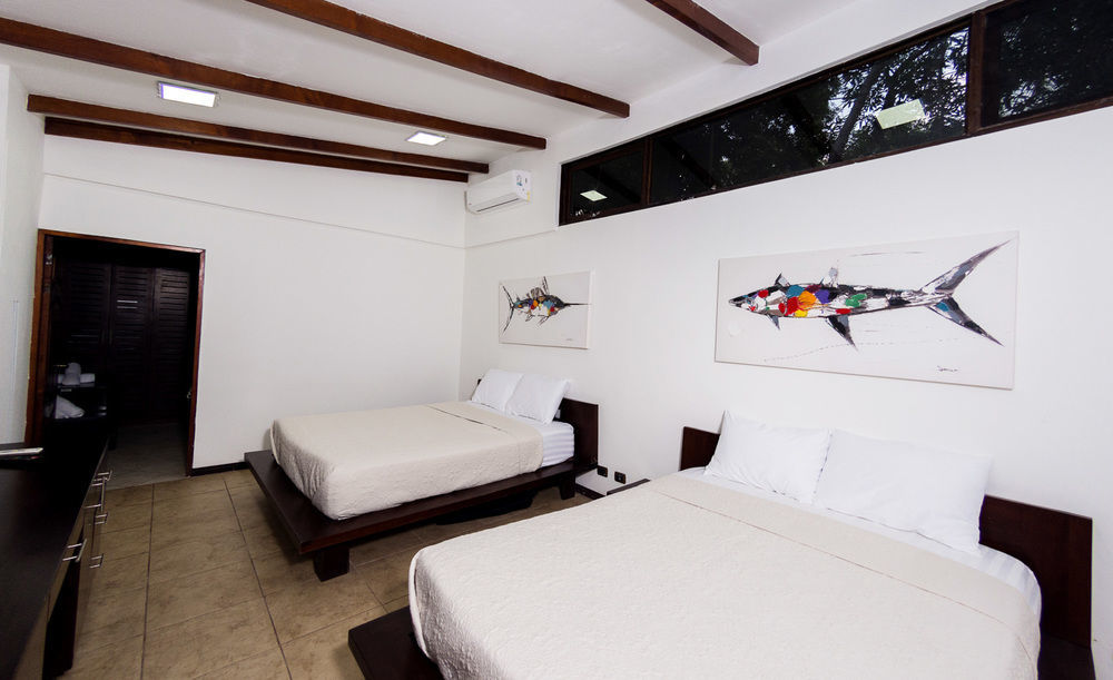 Café de Playa beach front suites Coco Esterno foto
